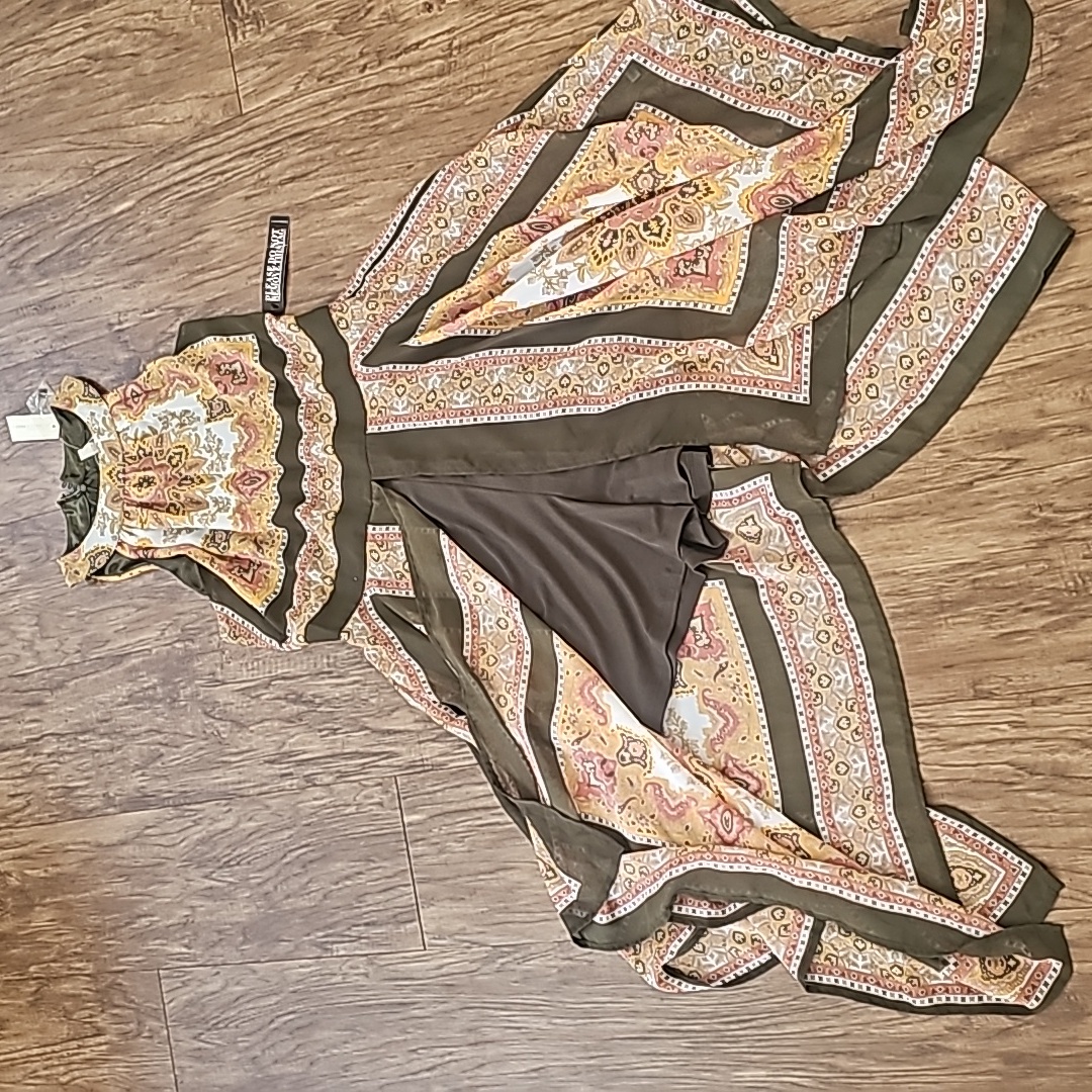 Dress With Point And Shorts Under.